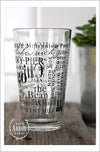 Right side view of Pint Glass featuring Chicago, Illinois with highlights from the town in black screen print.