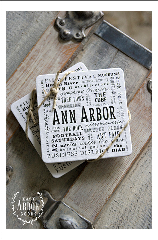 2 sets of drink coasters shown featuring Ann Arbor, Michigan. Each set comes with 6 thick cardstock coasters with black screen print.