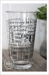 Left side view of Pint Glass featuring Chicago, Illinois with highlights from the town in black screen print