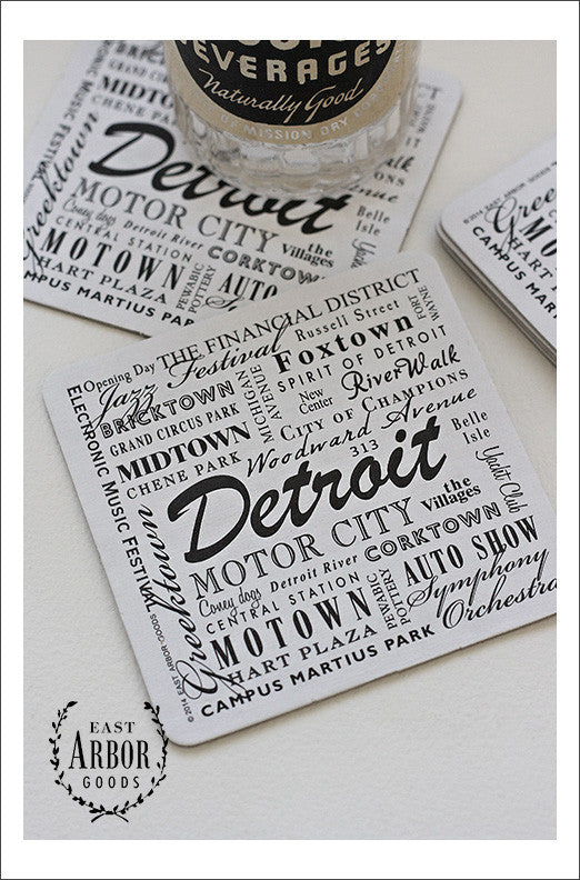 Drink coasters featuring Detroit, Michigan spread out on a white background.