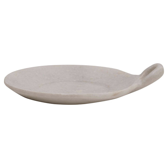 Side view of white marble dish to show how the sides curve up slightly.