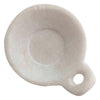 Close up of white marble dish. 
